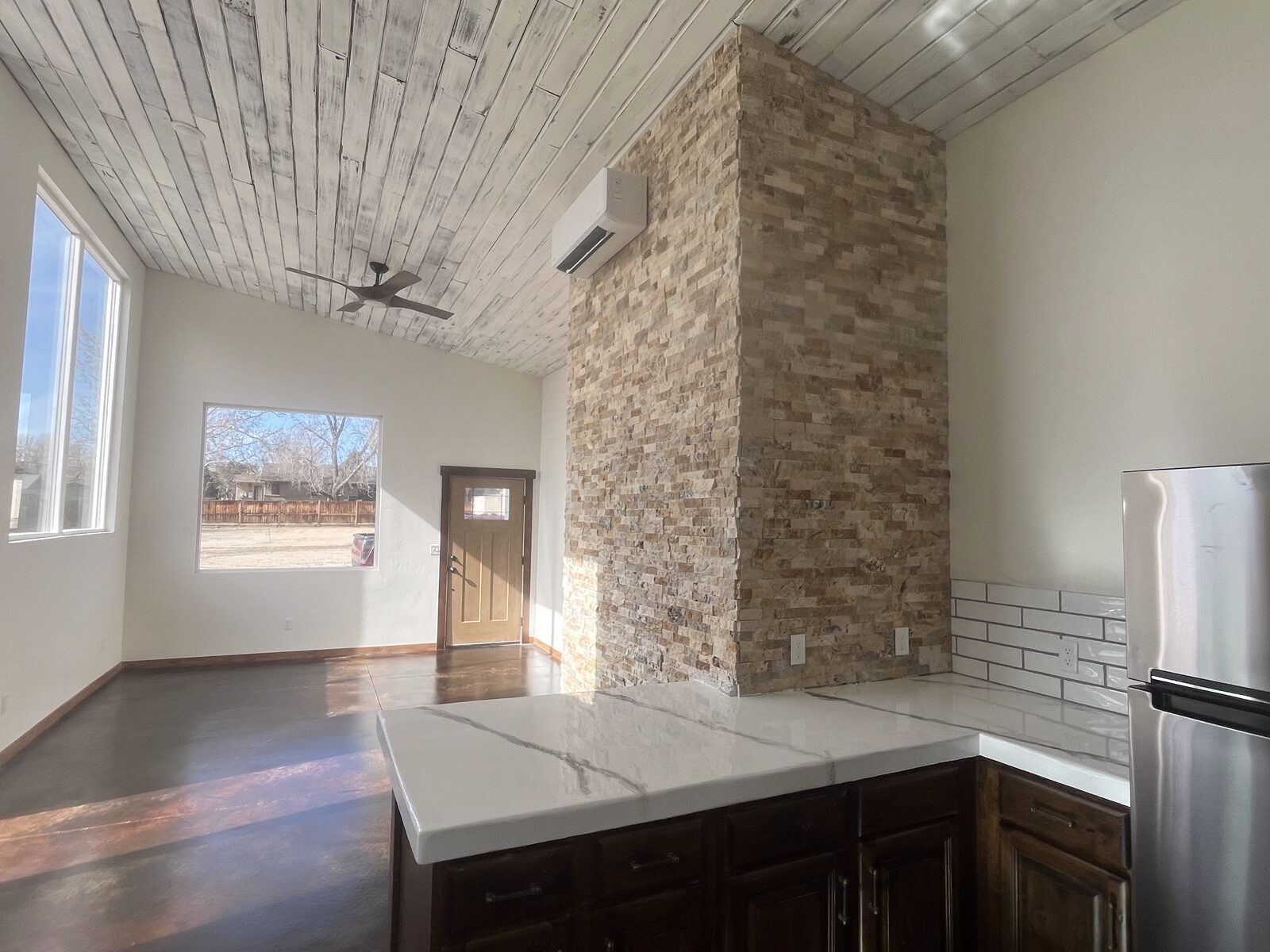 ADU, great room with stone accent